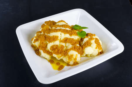 fresh cauliflower with butter and breadcrumbsの写真素材
