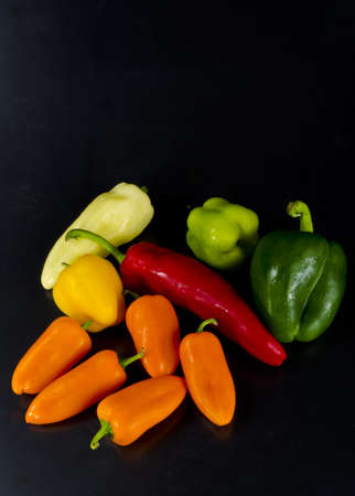 different coloured paprika kinds to foodの写真素材