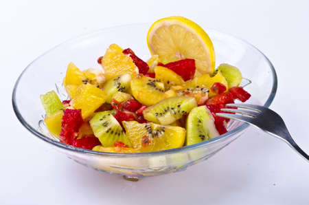 Fruit salad   is a dish consisting of various kinds of fruit, served in a liquid, either in their own juices or a syrup.の写真素材