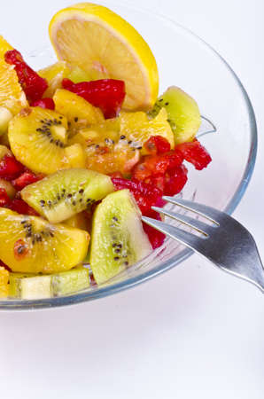 Fruit salad   is a dish consisting of various kinds of fruit, served in a liquid, either in their own juices or a syrup.の写真素材