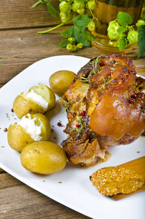 Roasted pork knuckle. Ham and bacon are popular foods in the west, and their consumption has increased with industrialisation.の写真素材