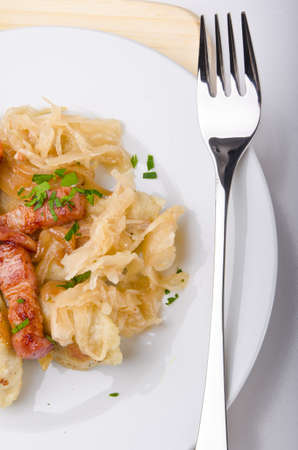 Silesian potato dumplings with smoked pork and sauerkrautの写真素材