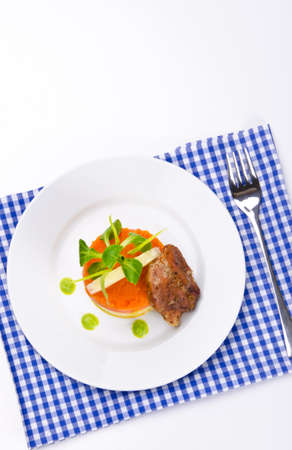carrots tureen with mashed potatoes and meatの写真素材