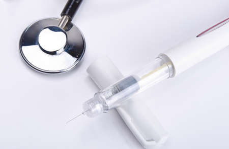 Insulin pen and Stethoscopeの写真素材