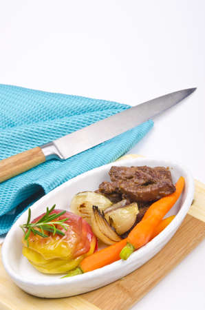 roasted liver with vegetables and appleの写真素材
