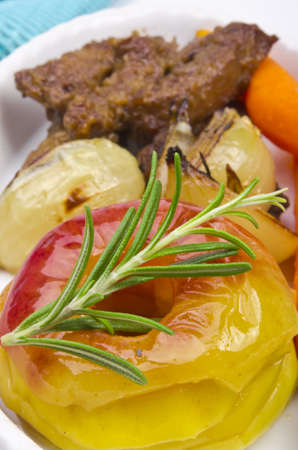 roasted liver with vegetables and appleの写真素材