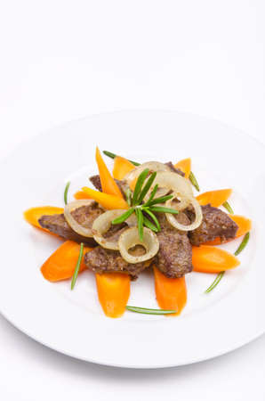 roasted liver with vegetables and appleの写真素材