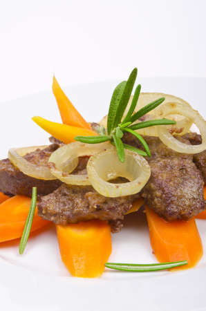 roasted liver with vegetables and appleの写真素材