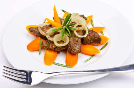 roasted liver with vegetables and appleの写真素材