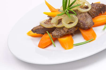 roasted liver with vegetables and appleの写真素材