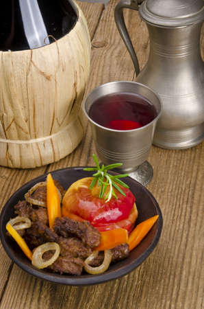 roasted liver with vegetables and appleの写真素材