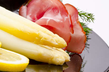 Asparagus, ham and sauce hollandaiseの写真素材