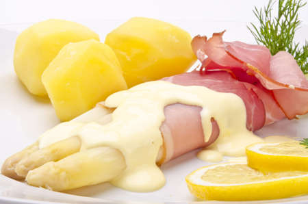 Asparagus, ham and sauce hollandaiseの写真素材