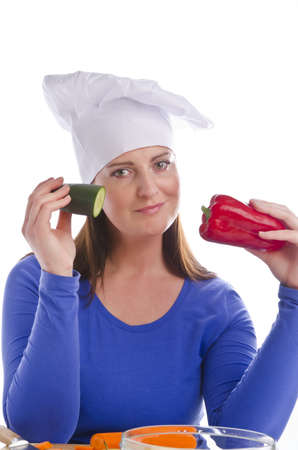 Woman with paprika and cucumberの写真素材
