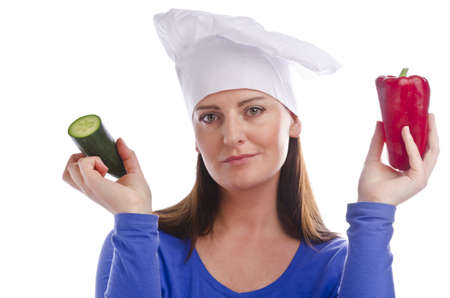 Woman with paprika and cucumberの写真素材
