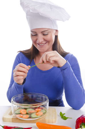 Woman with paprika and cucumberの写真素材