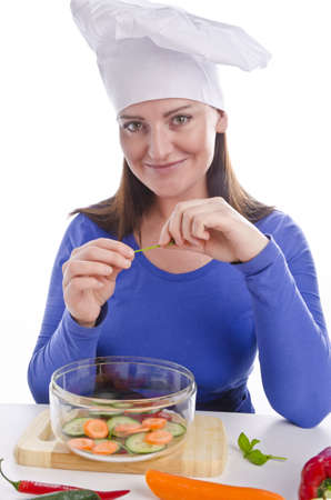 Woman with paprika and cucumberの写真素材