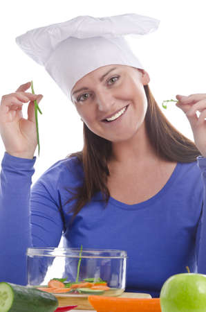 Woman with paprika and cucumberの写真素材