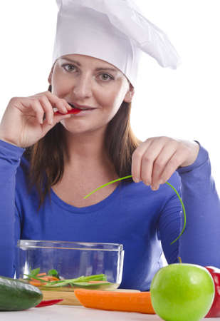 Woman with paprika and cucumberの写真素材