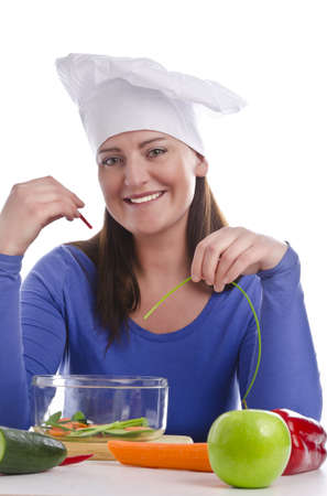 Woman with paprika and cucumberの写真素材
