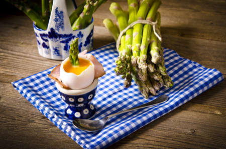 soft-boiled egg with asparagusの写真素材