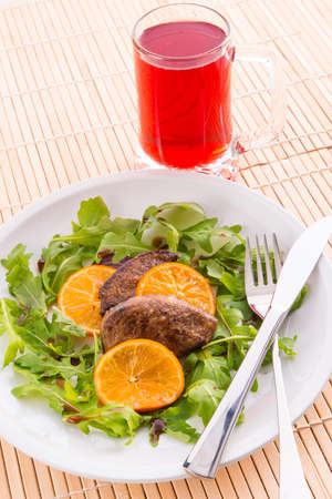 Liver with onion-orange sauceの写真素材