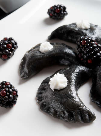 sweeten pierogi with blackberries - B   Wの写真素材
