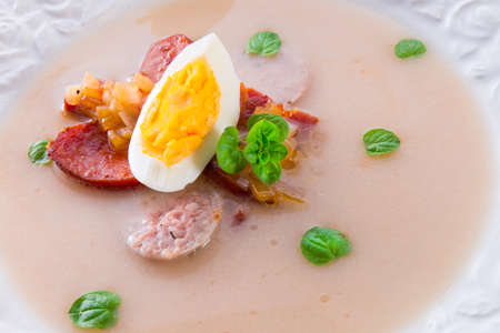 Polish Easter soup with egg and sausageの写真素材