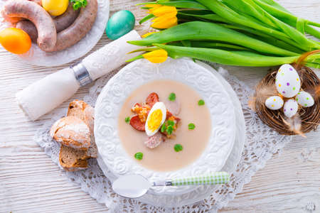 Polish Easter soup with egg and sausageの写真素材