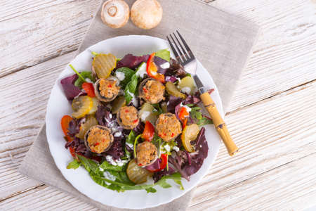 Grilled stuffed MUSHROOMS with colourful saladの写真素材