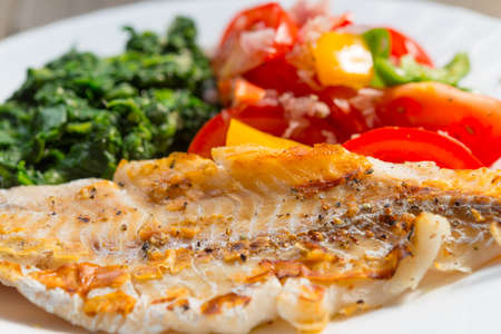 salmon sheet spinach tomatoの写真素材