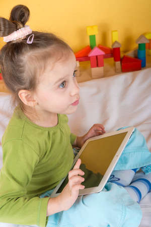 small girls with tablet