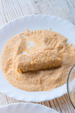 home-baked fish sticks with salad の写真素材