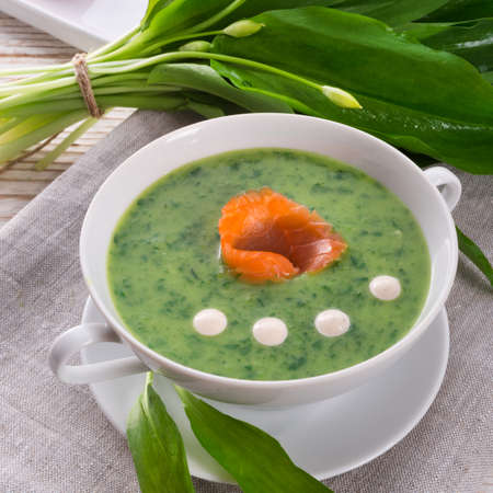 Bear allium soup with smoking salmonの写真素材