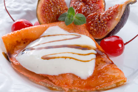  pancakes with figs and cherriesの写真素材