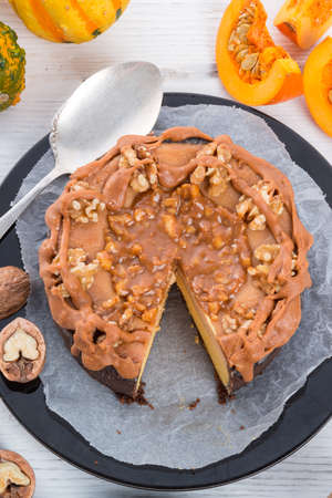 Pumpkin cheesecake with nutsの写真素材