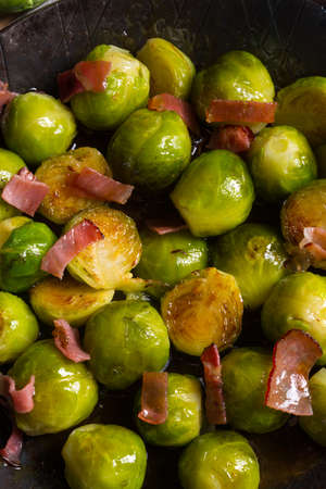 Honey caramelized brussels sprouts with hamの写真素材