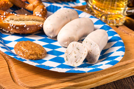 Bavarian sausage with pretzel, sweet mustard and beerの写真素材