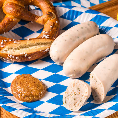 Bavarian sausage with pretzel, sweet mustard and beerの写真素材