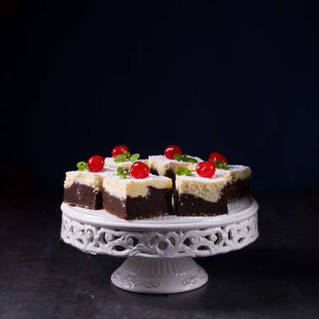 chocolate cream cake with cherriesの写真素材