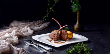 Grilled lamb chops with potatoesの写真素材