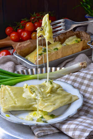 Swabian ravioli gratinated with cheeseの写真素材