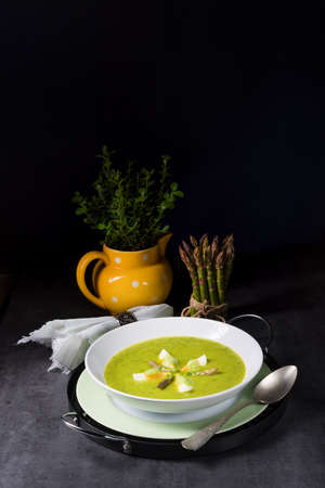 green wild garlic soup with eggの写真素材