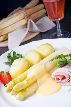 asparagus with boiled ham and hollandaise sauceの写真素材