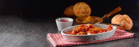 a traditional currywurst in delicious curry sauceの写真素材