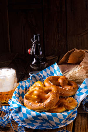 real homemade bavarian salty pretzel with beerの写真素材