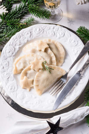 Polish style dumplings filled with sauerkraut and mushroomsの写真素材
