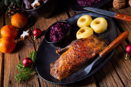 classic and crispy roasted duck with cabbage and dumplingsの写真素材