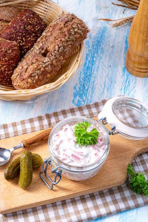 delicious homemade meat salad with mayonnaise and cucumberの写真素材