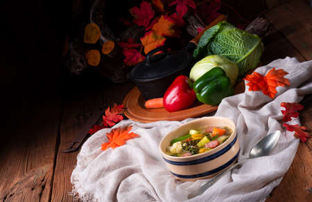 delicious autumnal vegetable soup with sausage and baconの写真素材